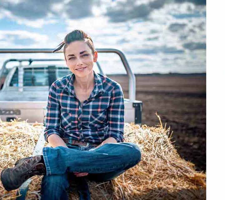 2020 Shine Awards logo plus the 2019 Shine Awards winner, Margy Perkuhn, sitting on a truck.