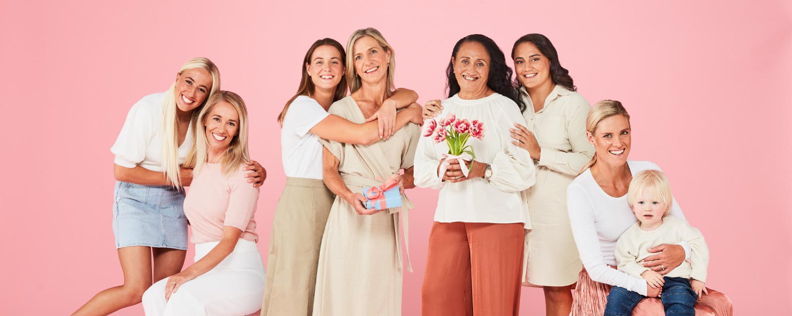 Surfer Sage Goldsbury, AFLW Player Nicola Barr, NRLW Player Annetter Brander and their Mums, and Paralympic Triathlete Kate Naess and her son.