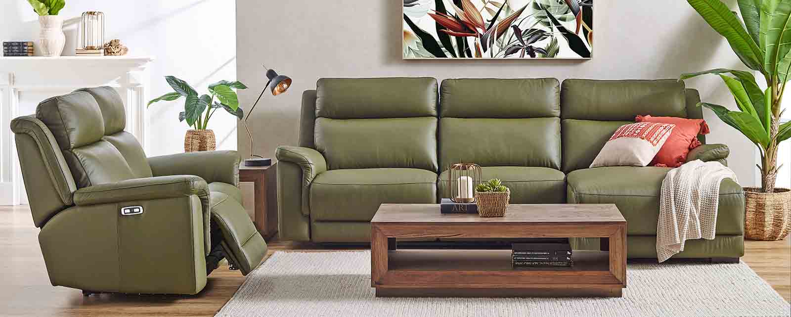 A comfortable reclining leather sofa suite.