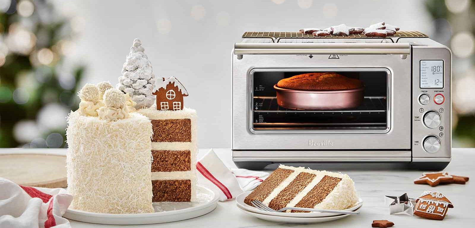 Gingerbread and Coconut Layered Cake next to the Breville Benchtop Oven.