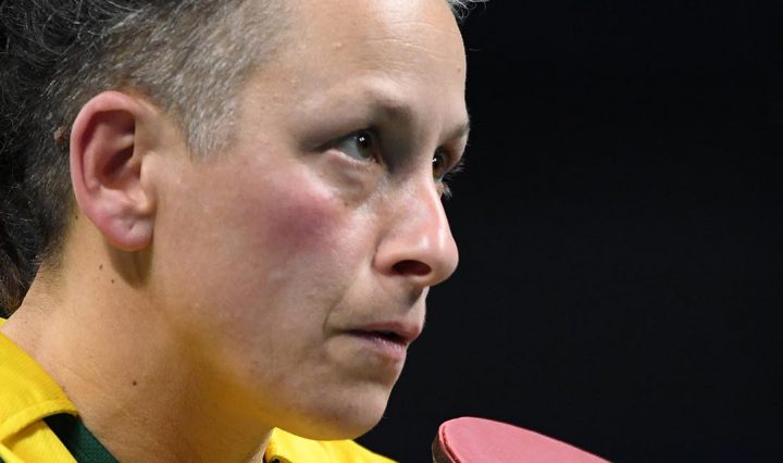 Paralympian Danni Di Toro with table tennis bat in hand.