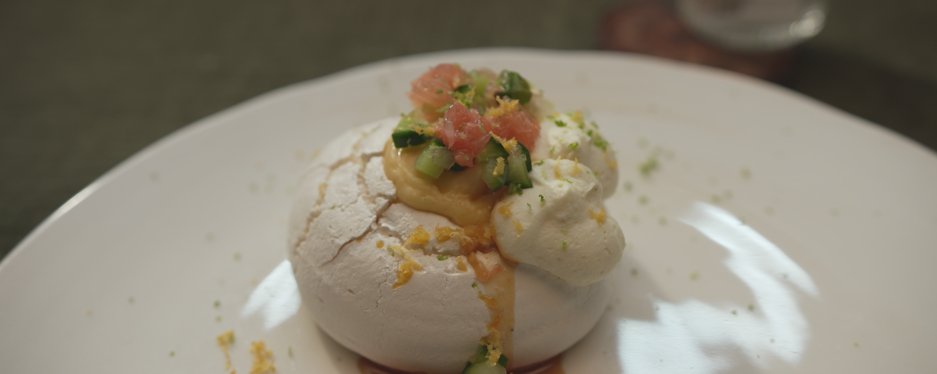 Grapefruit Pavlova plated on an episode of MasterChef Australia.