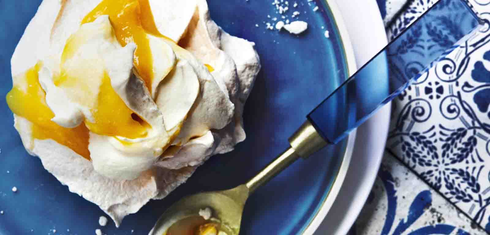 Mini Pavlovas with Crème Fraîche, Mango, and Tropical Curd recipe.