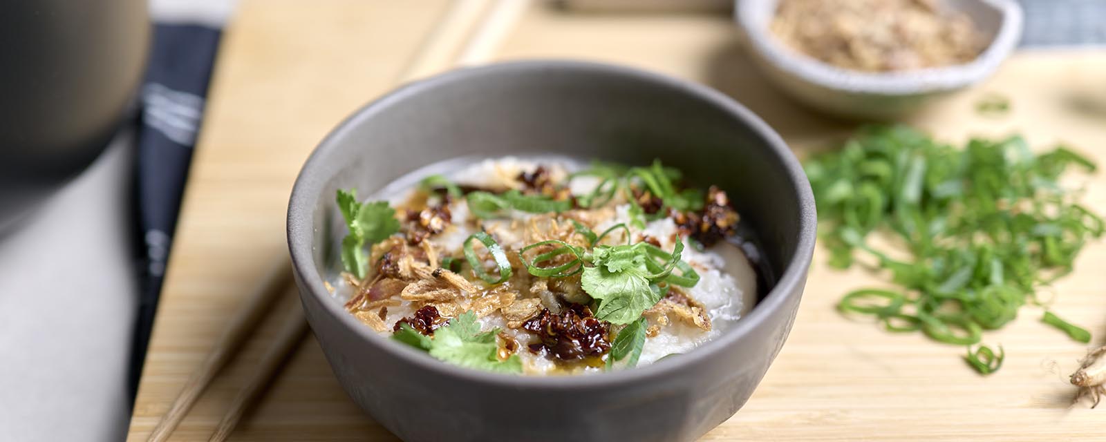 Mushroom Congee and chop sticks.