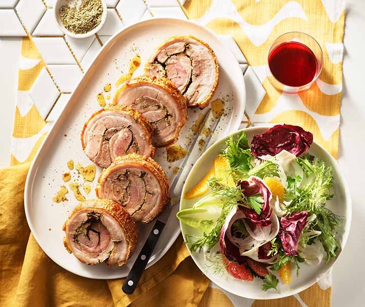 Native spiced porchetta with bitter leaf salad, citrus and herbs.