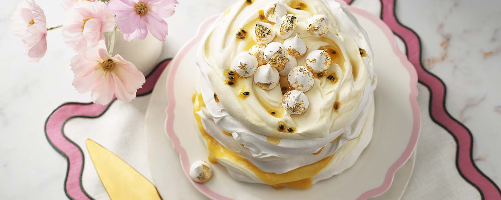 Plated Passionfruit Meringue Cake.