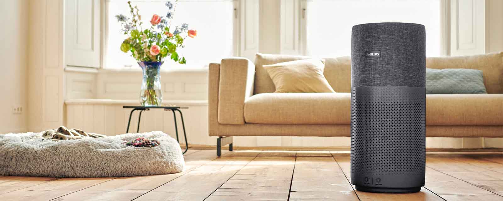 Philips Air Purifier Series 3000i in front of lounge.