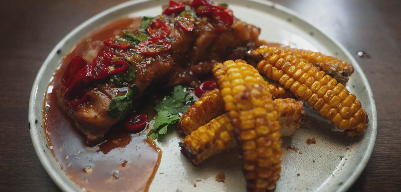 Pork Belly with Whiskey Sauce on a plate.