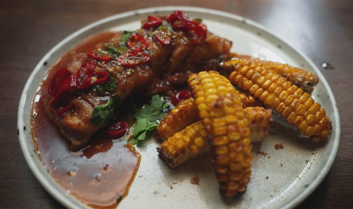 Pork Belly with Whiskey Sauce on a plate.