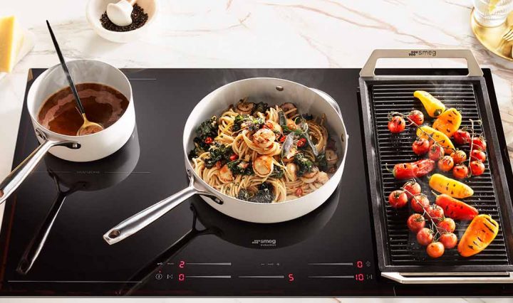 Abrolhos Island Scallop Bucatini cooking on the Smeg 900mm 5 Zone Induction Cooktop.
