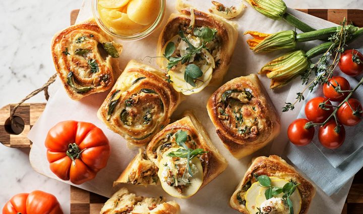Brioche Scrolls on a kitchen bench.