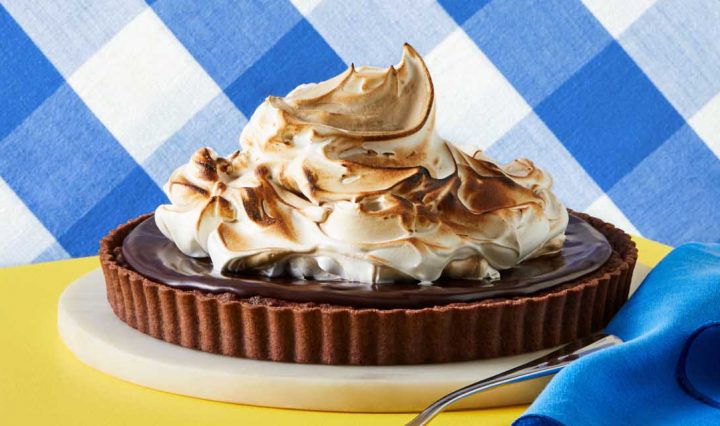 Chocolate Almond Tart with a blue napkin.