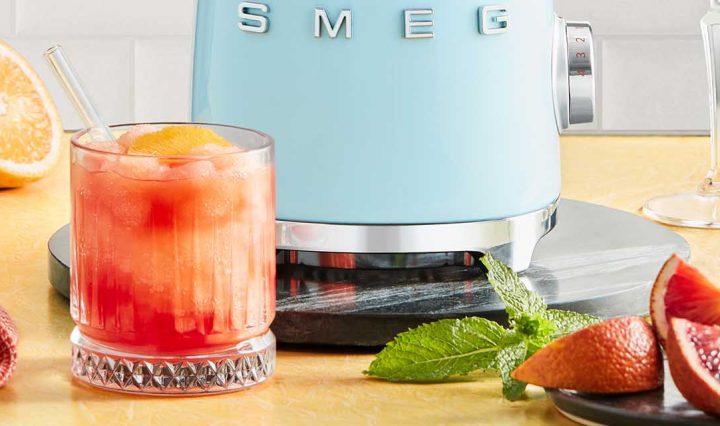 Frozen Negroni next to a Smeg blender.