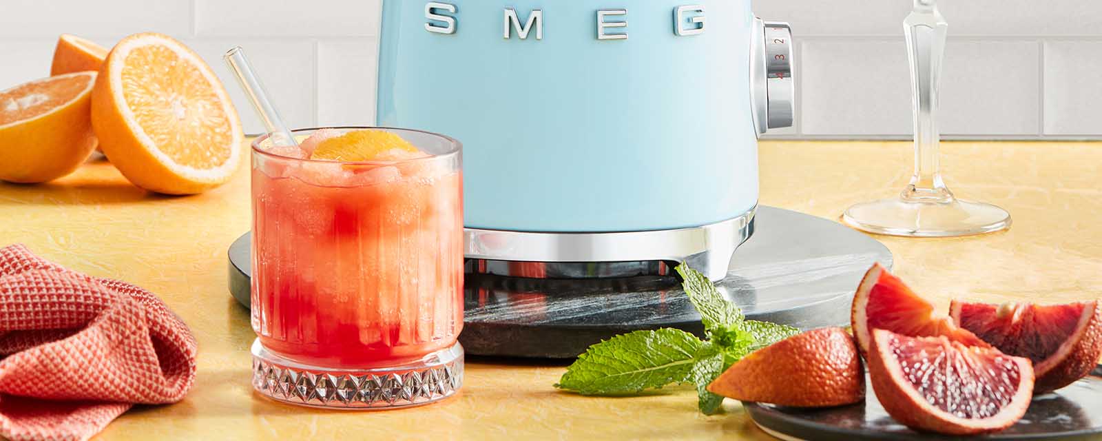 Frozen Negroni next to a Smeg blender.