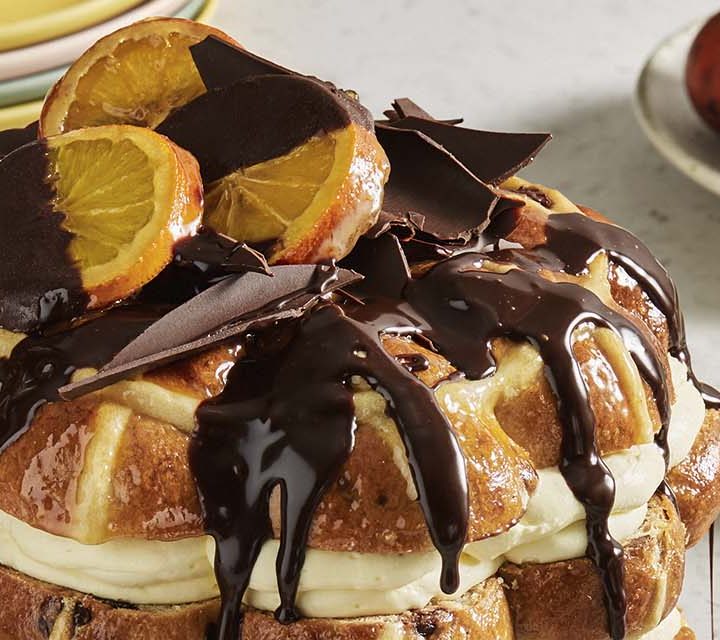 A close up photo of a Hot Cross Bun Cake.
