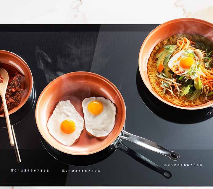 Turmeric and Coconut Pancake being cooked on the Miele Diamond 936mm Induction Cooktop.