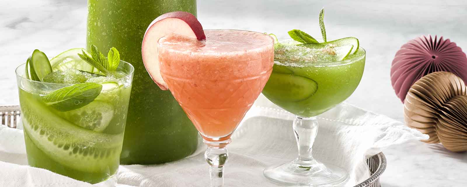 Our recipes for White Peach Aperol Spritz and Cucumber + Lime Gin Frappe.