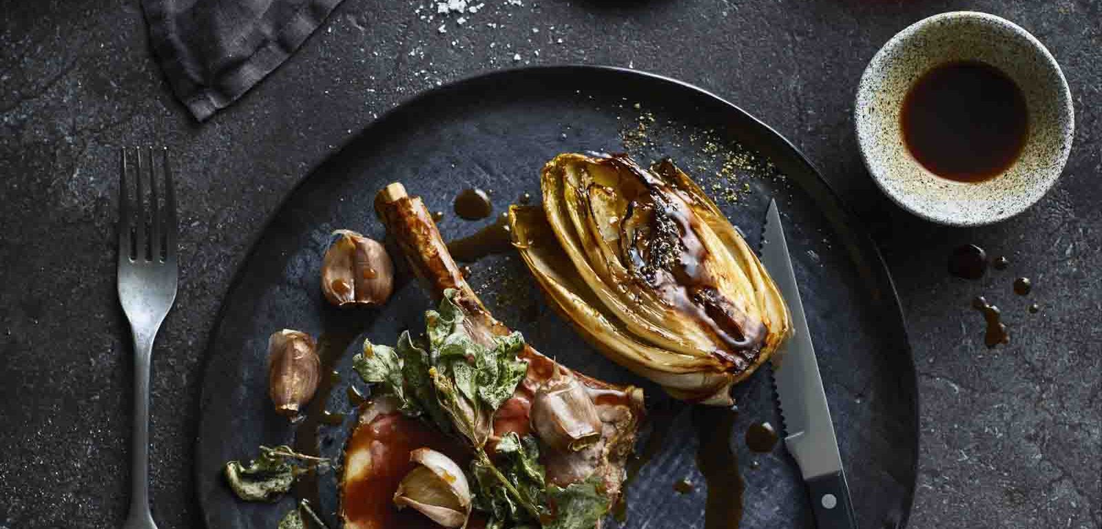 Roasted Rib of Beef with Witlof, Soft Garlic and Lardo Jus