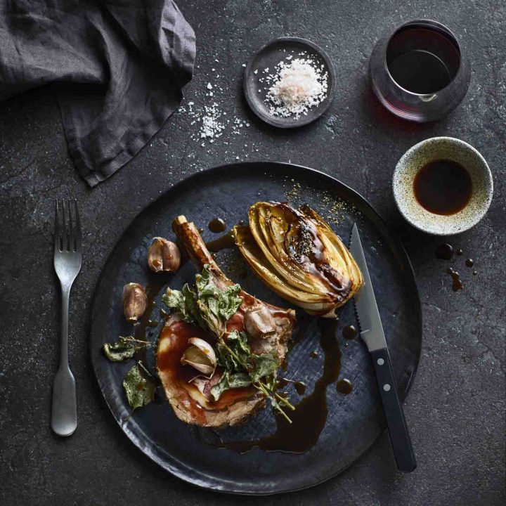 Roasted Rib of Beef with Witlof, Soft Garlic and Lardo Jus