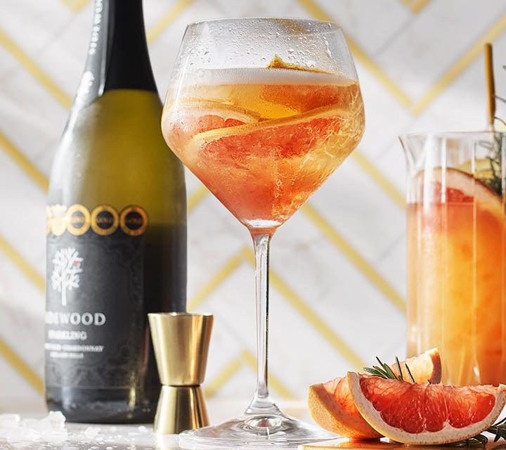 Sparkling Wine with Saffron Gin + Plum Vermouth.