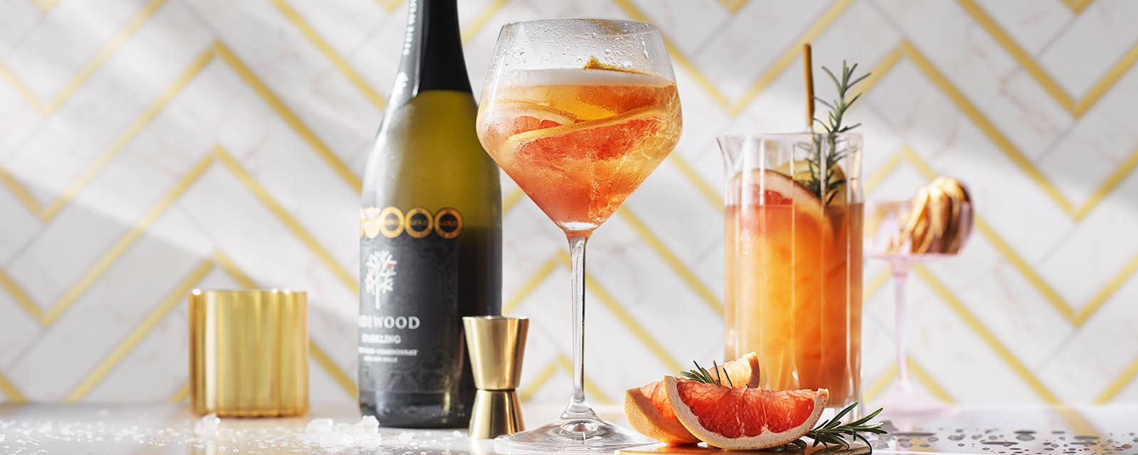 Sparkling Wine with Saffron Gin + Plum Vermouth.